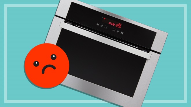 oven with unhappy face emoji